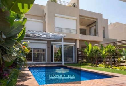Receive a panoramic villa of 316 meters with a private swimming pool, 3 floors, next to AL Karma, Cairo University and Roya Club