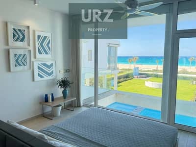 Two-bedroom chalet first row on Crystal Lagoon fully finished with air conditioning for sale Best location on the North Coast minutes from june sodic