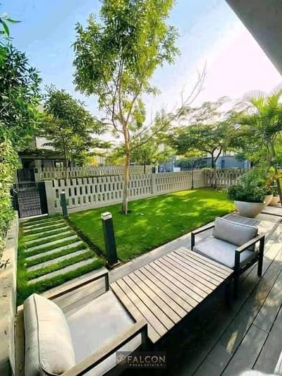 Apartment with a garden view at Lagoons, for sale in Sarai New Cairo compound - located next to Madinaty and opposite El Shorouk and New Heliopolis.