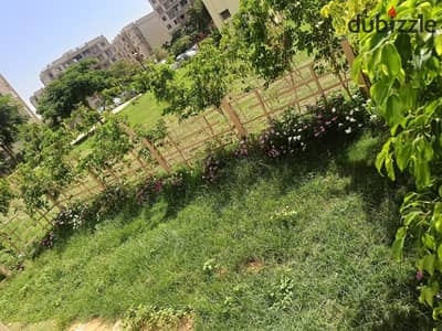 For sale in my city, a ground-floor apartment with a garden in B6, area 88 m and garden 46 m, prime location with a garden view, super lux finishes, first occupancy, all installments cleared.