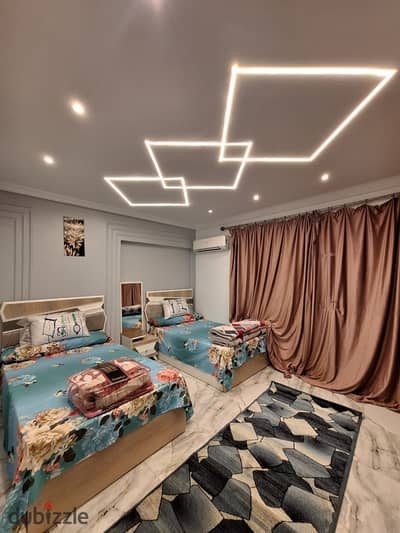 Furnished, air-conditioned hotel-style apartment next to City Stars, available for daily and monthly rent for families. Excellent location in Nasr Cit