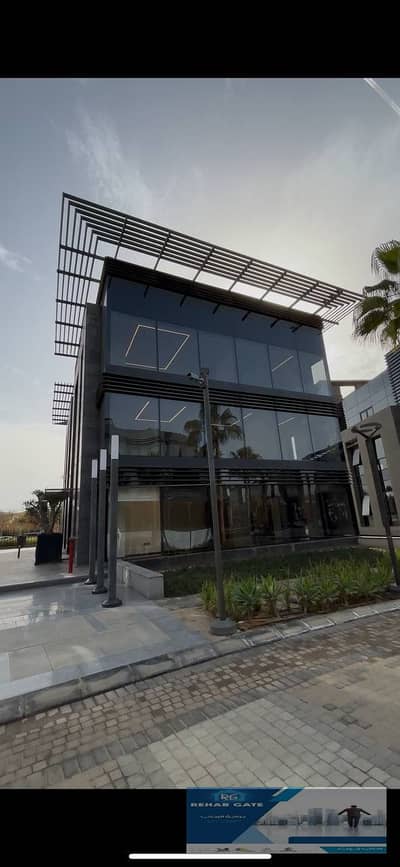 Sale of an Administrative Building (Stand Alone) with a Glass Facade - in Cairo Business Park