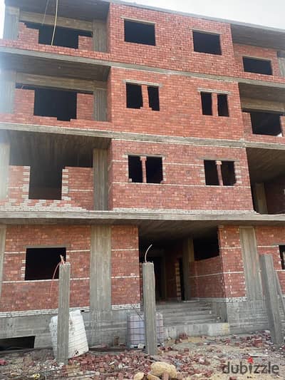 Building in the Fifth District, Beit Al-Watan, land area 715 square meters, fully built, structure and buildings, two apartments, 28 million required