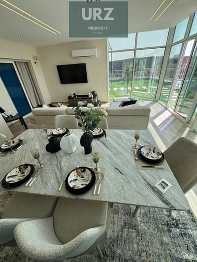 Apartment for sale with a 40% discount rented in dollars pool view for sale minutes from Sheraton Taj City and Cairo Airport