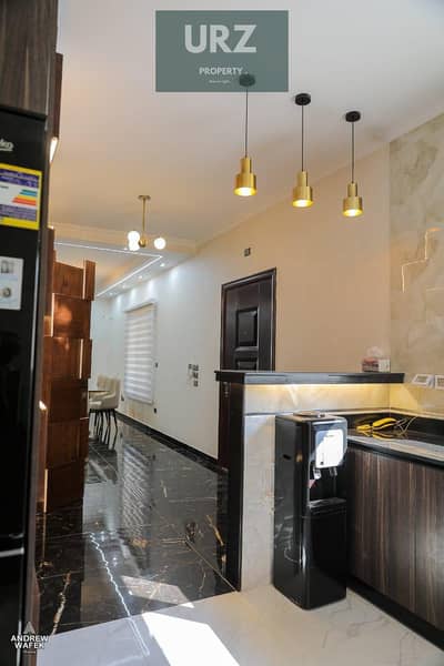 Guaranteed investment with a return in dollars A hotel-finished apartment with air conditioning for sale in a vital location in Sheraton