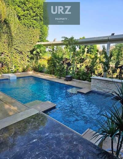Standalone villa with a pool, fully finished, with installments over 10 years, interest-free, and a 50% discount on its price, directly on the Suez Ro