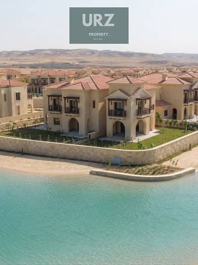 افخم فيلا تاون هاوس 5 غرف corner فيو علي lake بخصم 50 % او تقسيط علي طريق السويس للبيع بالقرب من الرحاب و the spine ومانتن فيو وكريك تاون و ذا مارك
