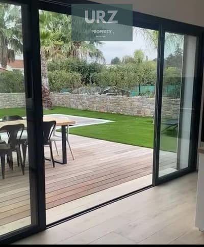 Own a villa with 12-year installments facing the largest landscape plot in a compound connecting Fifth Settlement and Mostakbal City near Privado