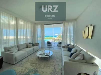 First row beachfront villa with hotel-style finishing and private pool for sale in Marsa Baghosh near Silver Sands Almaza Bay and Hacienda Modon