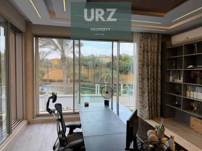 5-bedroom corner villa with 3 floors for sale at 50% discount on Suez Road, minutes from AUC, near Madinaty, Rehab, Mountain View & Mivida.