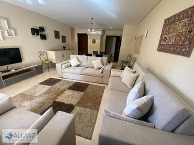 Furnished 145m² apartment with a garden for rent at Avenue 90, Fifth Settlement (directly opposite the American University).