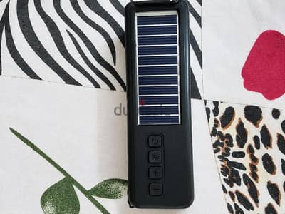  للبيع سماعة بلوتوث D30 يعمل بالطاقه الشمسيه + كشاف قوووووي جدااااا