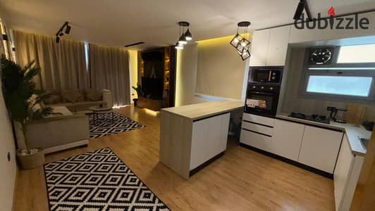 Apartment for sale in the Compound One Qatamiyah 130 m super lux with furnishings, open view of the administrative towers