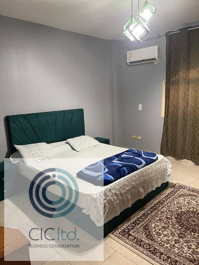**Furnished apartment for rent in 6 October, First District – Neighborhood 8 | 130m | Raised Ground | Two Bedrooms | Fully Air-conditioned | Clean Furnishings | Close to MSA and Wadi Degla |