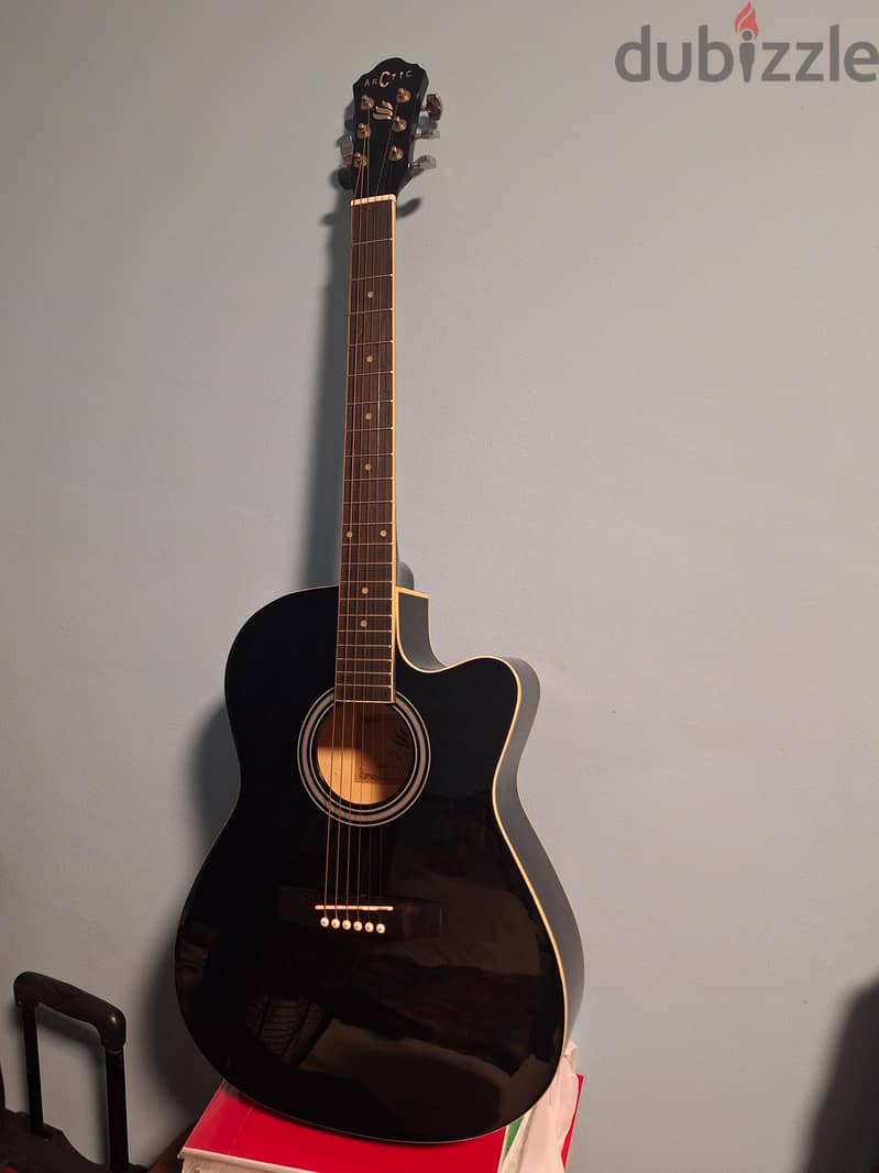 black acoustic guitar 3