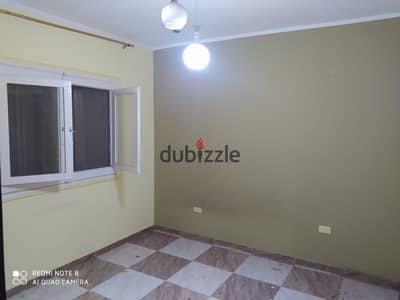 118m² apartment for sale in Al-Janna Al-Khadra (Green Paradise); high-end finishing; prime location in the Fourth District.