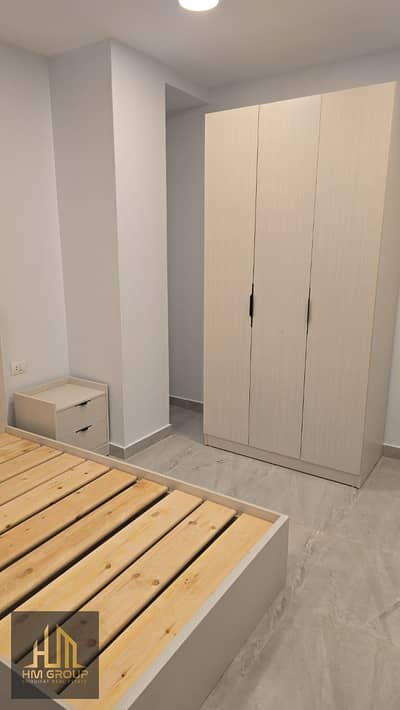 Furnished studio for rent with a room, bathroom, and small kitchen in Al-Zahwa Compound, South Investors.