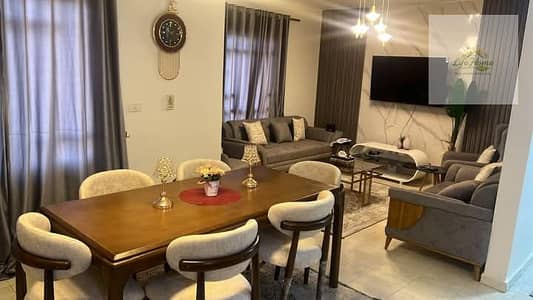 Furnished apartment for rent in Al Rehab with two bedrooms, Phase Five