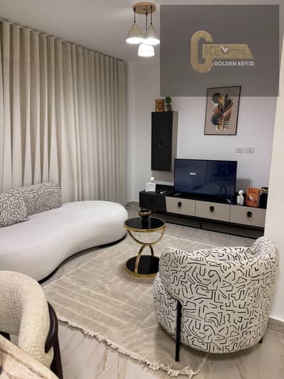 Luxury apartment with premium special finishing, elegant modern design, and a prime location close to all services in Madinaty.