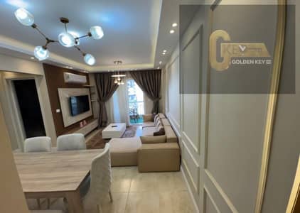 Luxury apartment with premium special finishing, elegant modern design, and a prime location close to all services in Madinaty.
