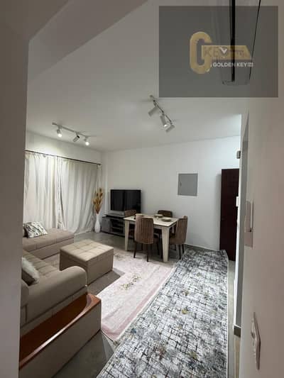 Luxury apartment with premium special finishing, elegant modern design, and a prime location close to all services in Madinaty.