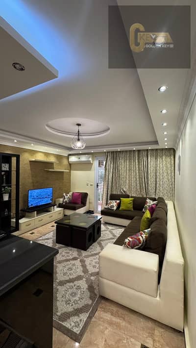 Luxury apartment with premium special finishing, elegant modern design, and a prime location close to all services in Madinaty.