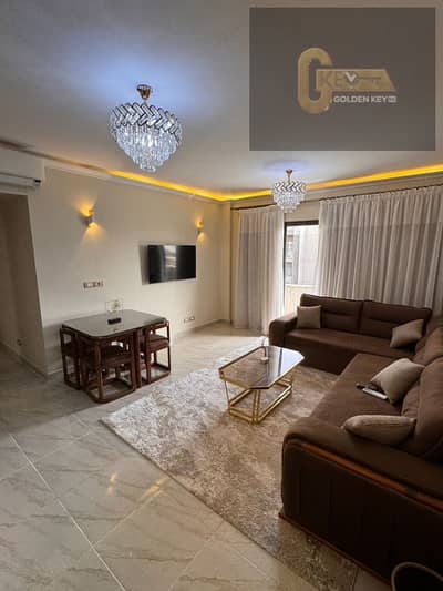 Luxury apartment with premium special finishing, elegant modern design, and a prime location close to all services in Madinaty.