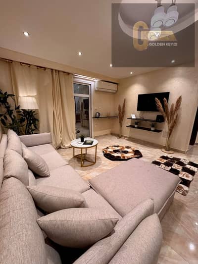 Luxury apartment with premium special finishing, elegant modern design, and a prime location close to all services in Madinaty.