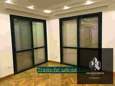 4-bedroom triplex - open view - for sale at the lowest market price in Sodic Eastown, Fifth Settlement - immediate delivery - prime location