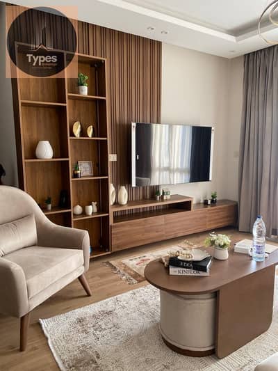 Available for sale in Al-Khamayel Compound, Sheikh Zayed (Phase 1): 175 sqm apartment First-floor level (one floor above ground) Includes a share of t