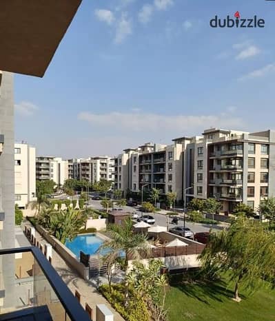 Apartment for sale in the heart of Fifth Settlement on 90th Street, in front of the American University (AUC), New Cairo.