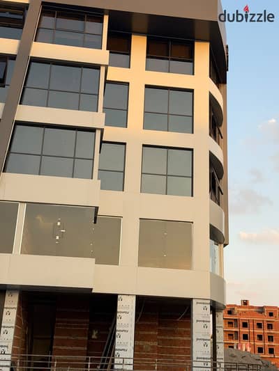 Shop for sale at two corners, immediate delivery, installment over a year and a half with an area of 31 m in New Obour City