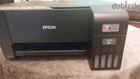 طابعة و سكانر EPSON الوان بحالة جيدة جدا