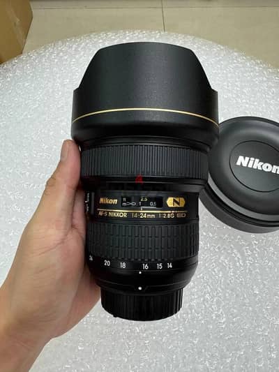 بيع او بدل لينس نيكون 24-14 F2.8G جديدة