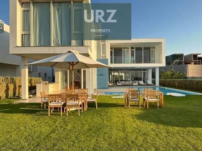 علي خليج راس الحكمة لاول مرة فيلا luxury صف اول علي البحر علي Natural lagoon في مدن الساحل الشمالي بالقرب مراسي  وسول ومرسي بغوش والماظة باي للبيع