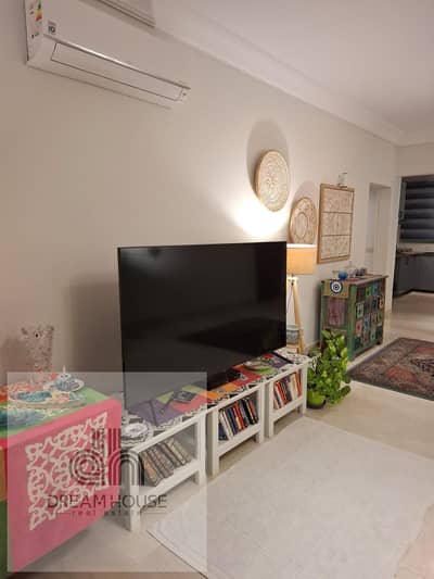 Apartment for sale in El Patio 7 New Cairo, fully finished with appliances and ac's