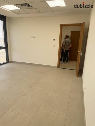 56 sqm fully finished medical clinic for rent in SODIC West, Sheikh Zayed, with examination room, waiting area, central AC and dedicated parking.