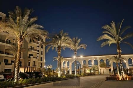 Apartment 75 sqm for sale fully finished with ACs in Village West, Sheikh Zayed