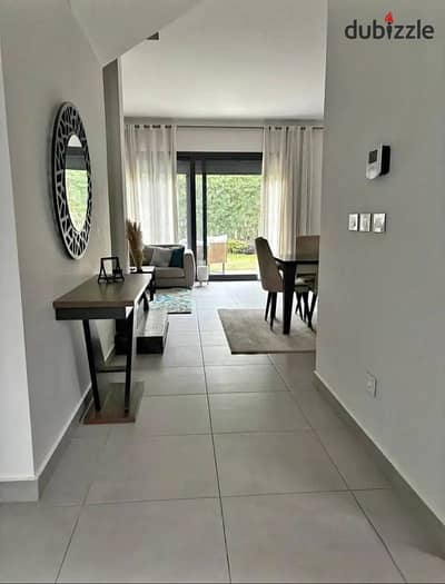 Apartment for sale with a 40% discount, situated in a prime location within "The Icon" compound in New Cairo's Fifth Settlement.
