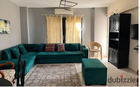In Al-Rehab, furnished 2-bedroom apartment with garden area available for rent