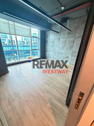 Office for rent, finished with air conditioning, 207 m directly on the axis, Capital Business Park in the heart of Sheikh Zayed