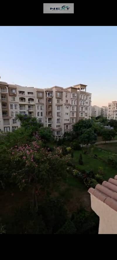 For sale in Madinaty (cash payment, exceptional price): A 200-square-meter apartment in Zone B1. It features a direct view of the wide garden, a true
