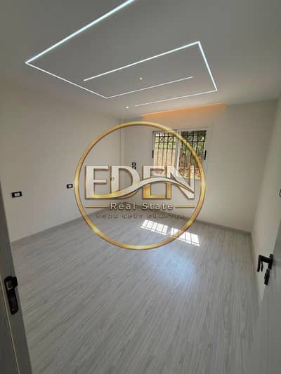 For sale in Madinaty, an apartment of 103 sqm, ground floor with a 50 sqm garden, special finishing, first occupancy - Garden view.