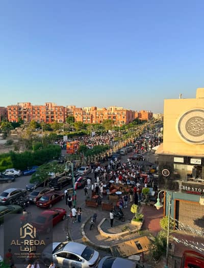 محل دورين للايجار  في مول المعز روضة زايد