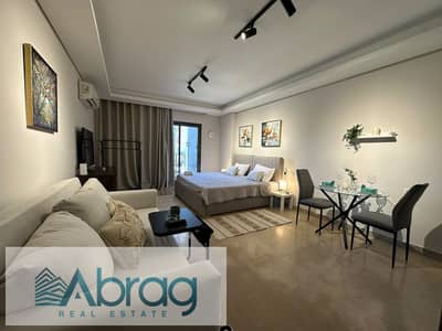 Studio for sale at Zed Towers, Sheikh Zayed: 60 sqm, modern furnished, air-conditioned, and ready for immediate handover. Payment plan involves taking