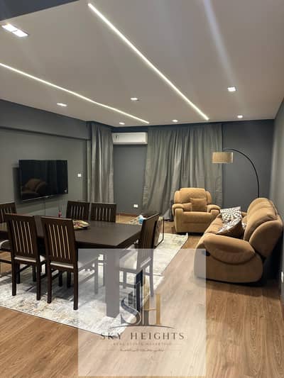 Apartment for sale in the "New Seventh" district of Al Rehab 2, measuring 99 sqm. It features a layout of 2 bedrooms and 1 bathroom, with fully custom