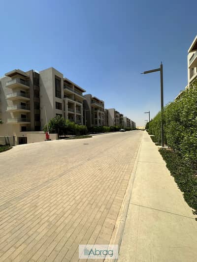Ground-floor 2-bedroom apartment for sale in The Address East compound, New Cairo (Fifth Settlement). Prime location, ready for immediate delivery, an