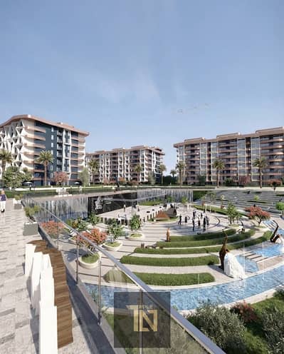 شقه للبيع ارضي بجاردن كاش بمقدم 10% و اقسط الكاش علي سنتين  في كمباوند midtown condo في R7 داخل العاصمه الاداريه 10 دقائق من القاهره الجديده