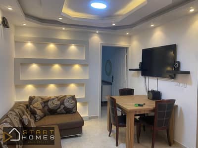 Apartment for sale in Al Rehab, featuring a prime location and high-end finishes, a practical layout, and spacious rooms, close to amenities