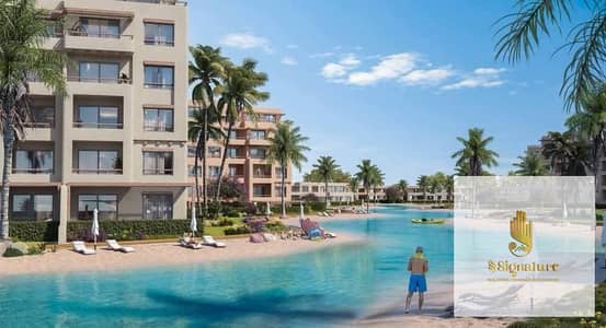 Corner chalet for sale with ultra-super-lux finishing at Hacienda Waters, Ras El Hekma, North Coast; lagoon view; handover in 2029.